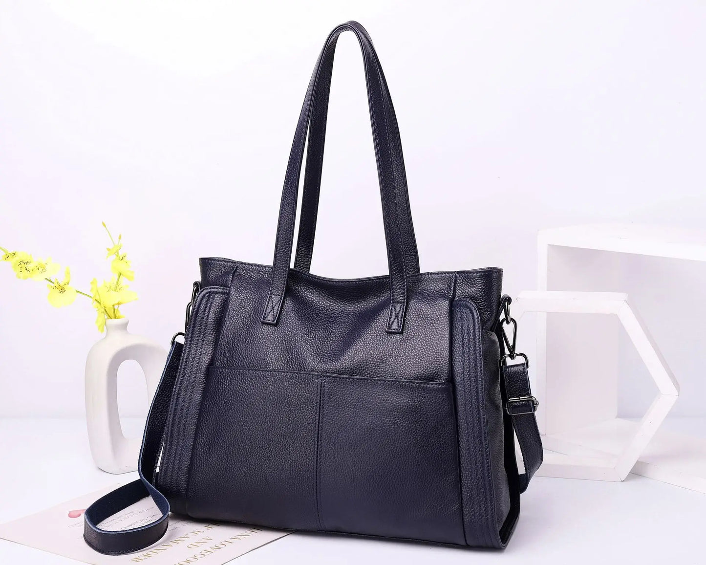 Experience effortless sophistication with this Genuine Leather Cowhide Women’s Tote, a large-capacity luxury designer bag crafted for modern women and mothers. Perfect as a handheld, shoulder, or crossbody bag