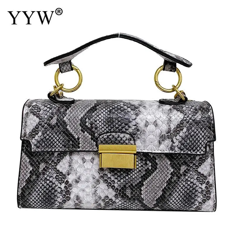 Make a bold statement with this Snakeskin Pattern Luxury Women’s Bag 2023, crafted from premium PU leather with a modern square silhouette. A chic designer tote and crossbody — perfect for confident, fashionable women.

h