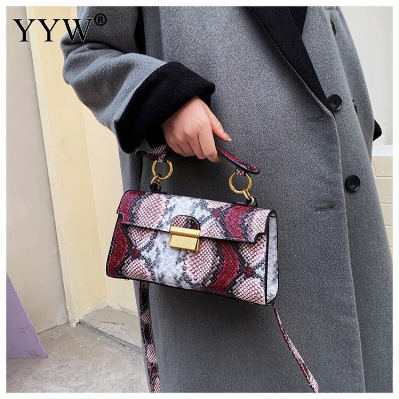 Make a bold statement with this Snakeskin Pattern Luxury Women’s Bag 2023, crafted from premium PU leather with a modern square silhouette. A chic designer tote and crossbody — perfect for confident, fashionable women.

h