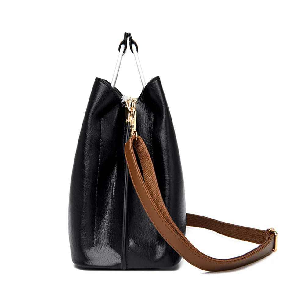 Step into timeless elegance with this Genuine Brand Leather Tote Bag, a luxury designer handbag crafted from high-quality leather. Perfect as a ladies crossbody or handbag, designed for women who appreciate quality