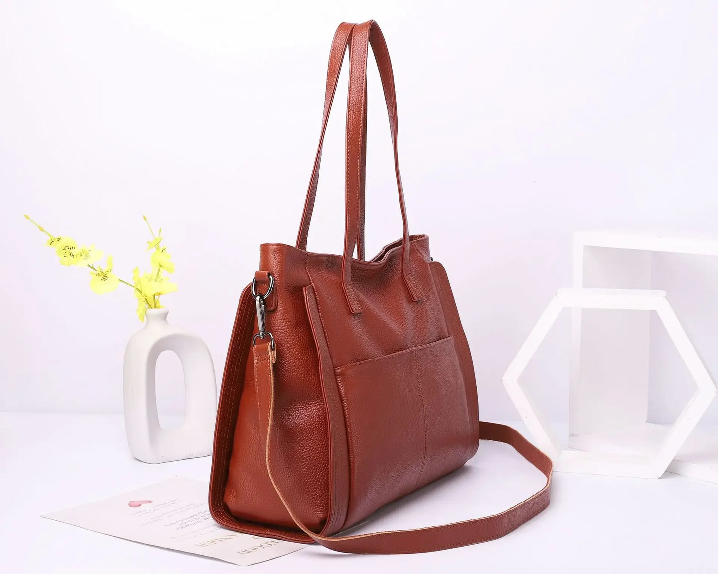 Experience effortless sophistication with this Genuine Leather Cowhide Women’s Tote, a large-capacity luxury designer bag crafted for modern women and mothers. Perfect as a handheld, shoulder, or crossbody bag