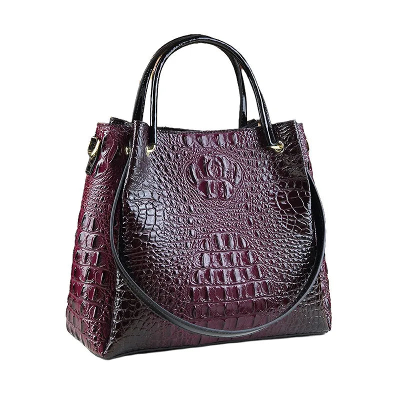 Introducing the Valeria Croco Bucket Tote, a statement piece from the Holland Luxe Global Collectors’ Collection. Designed with a crocodile-embossed finish and a retro-inspired silhouette