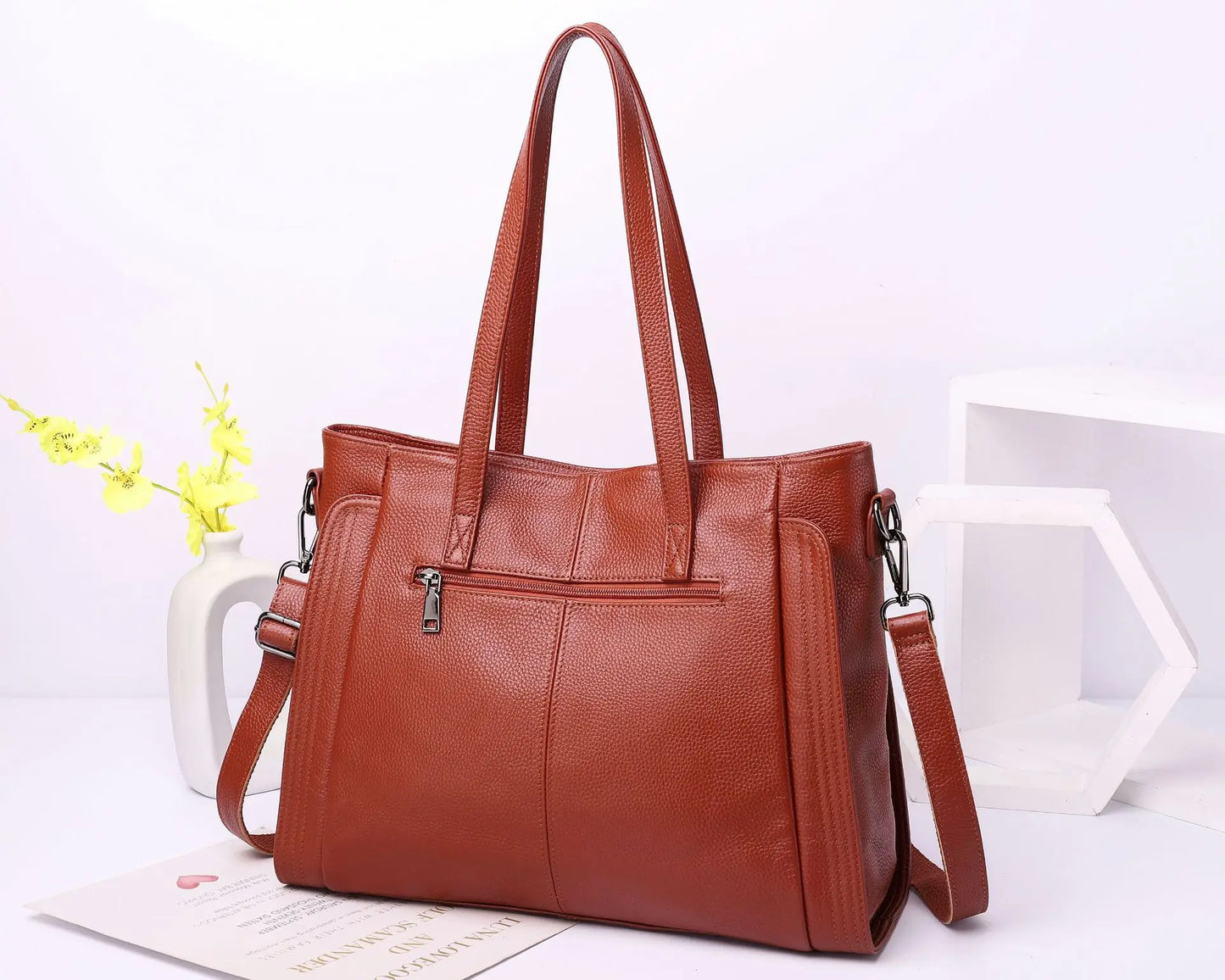 Experience effortless sophistication with this Genuine Leather Cowhide Women’s Tote, a large-capacity luxury designer bag crafted for modern women and mothers. Perfect as a handheld, shoulder, or crossbody bag