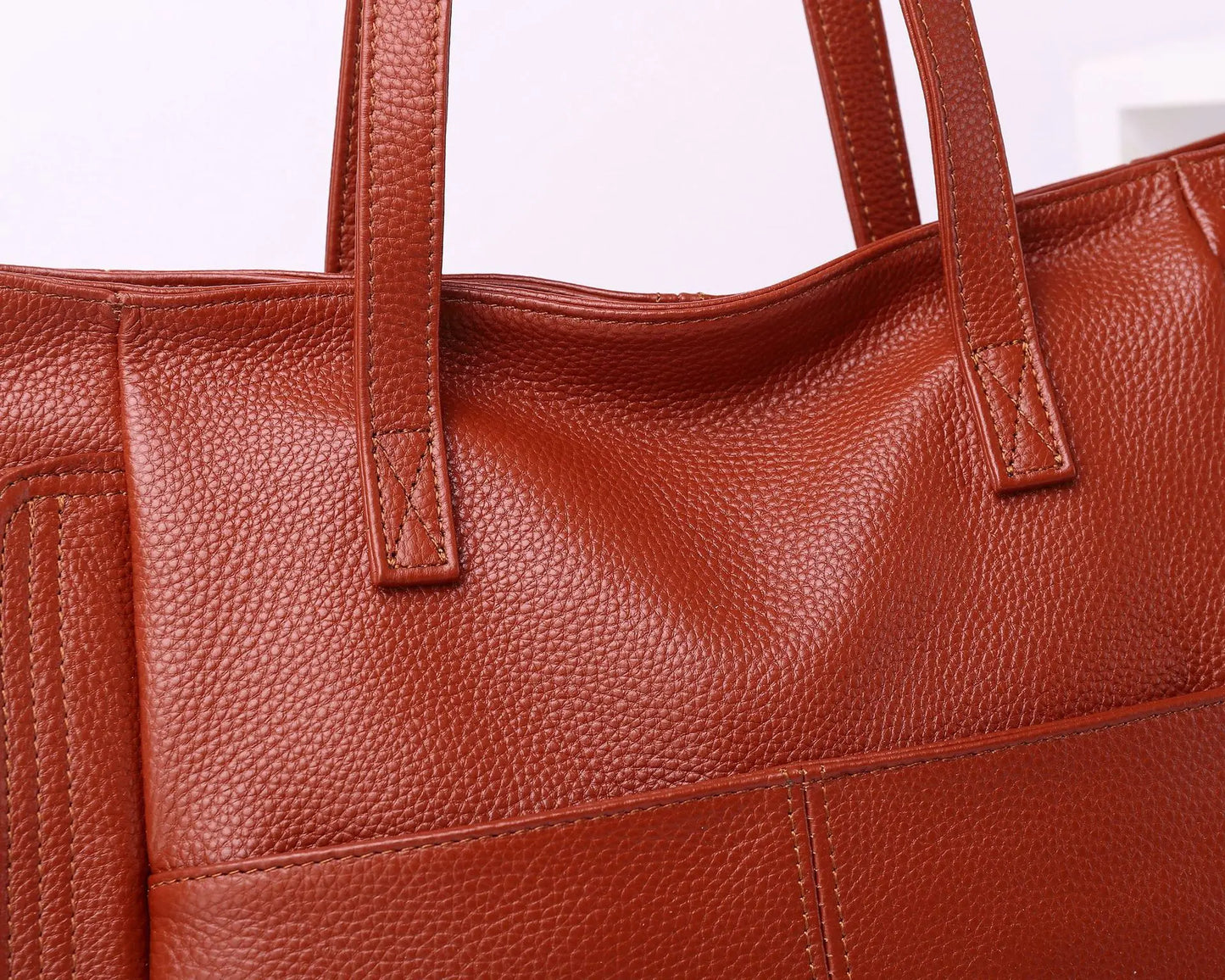 Experience effortless sophistication with this Genuine Leather Cowhide Women’s Tote, a large-capacity luxury designer bag crafted for modern women and mothers. Perfect as a handheld, shoulder, or crossbody bag