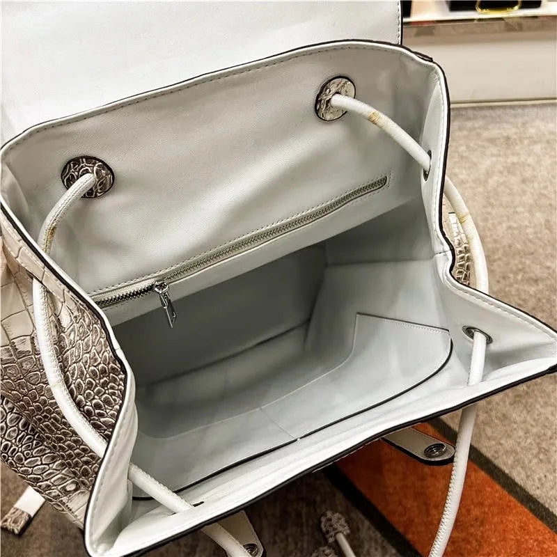 Genuine Crocodile Skin Backpack – Premium Designer Vintage Edition

Crafted from rare, authentic crocodile skin, this backpack is more than a bag — it’s a collector’s masterpiece. With its natural, one-of-a-kind scale