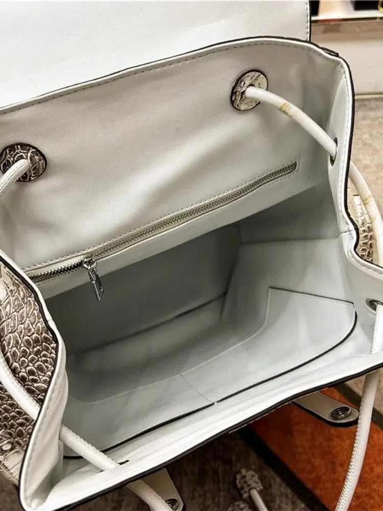 Genuine Crocodile Skin Backpack – Premium Designer Vintage Edition

Crafted from rare, authentic crocodile skin, this backpack is more than a bag — it’s a collector’s masterpiece. With its natural, one-of-a-kind scale