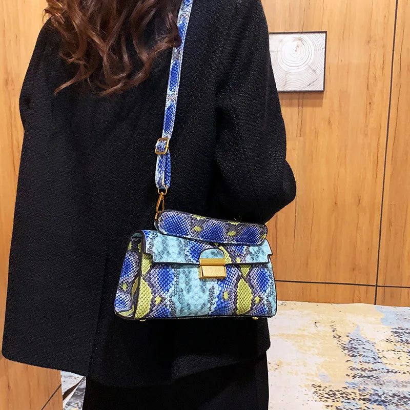 Make a bold statement with this Snakeskin Pattern Luxury Women’s Bag 2023, crafted from premium PU leather with a modern square silhouette. A chic designer tote and crossbody — perfect for confident, fashionable women.

h