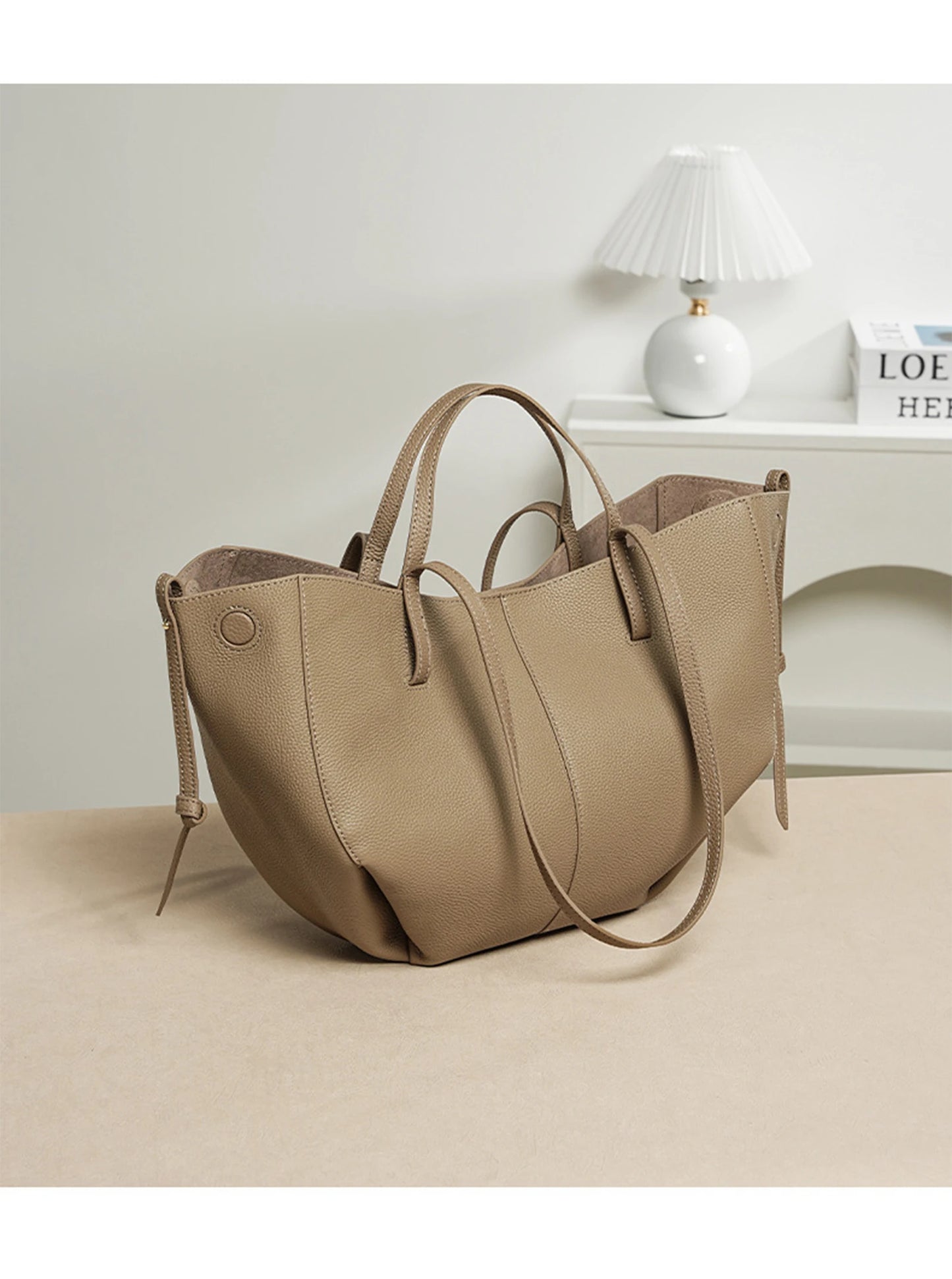 Indulge in timeless elegance with this Luxury Cow Leather Tote Bag, a spacious designer handbag crafted for the modern woman. Stylish and versatile — perfect as a shoulder, hobo, or shopper bag for everyday sophistication.