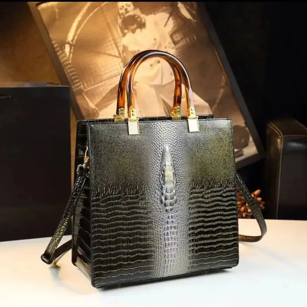 Elevate your everyday elegance with this Genuine Leather Women’s Tote Bag, featuring a luxury crocodile pattern and trend-setting vertical design. Perfect as a fashionable shoulder or messenger bag for stylish women