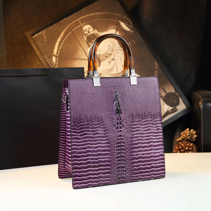Elevate your everyday elegance with this Genuine Leather Women’s Tote Bag, featuring a luxury crocodile pattern and trend-setting vertical design. Perfect as a fashionable shoulder or messenger bag for stylish women