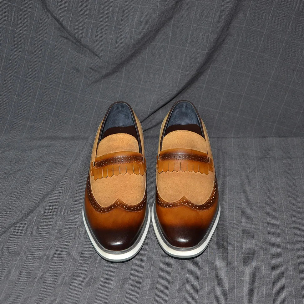 1.	HollandLuxe Exclusive – European Cow Suede Leather Wingtip Loafers
	2.	Luxury Men’s Sneakers-Loafers – Genuine Leather with Tassel Detail
	3.	Collector’s Edition Suede Wingtip Slip-On – Business & Casual Elegance