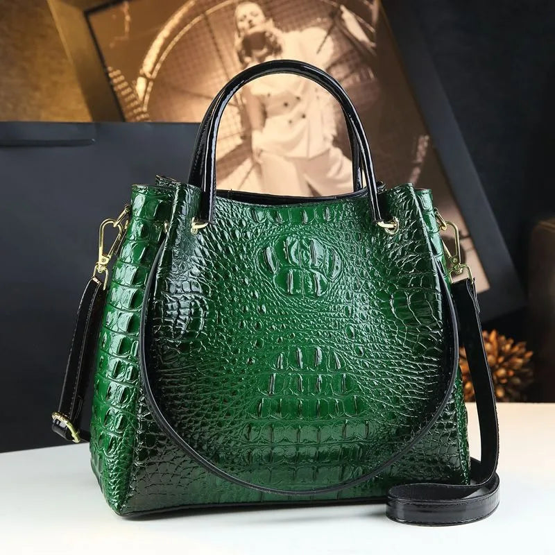 Introducing the Valeria Croco Bucket Tote, a statement piece from the Holland Luxe Global Collectors’ Collection. Designed with a crocodile-embossed finish and a retro-inspired silhouette