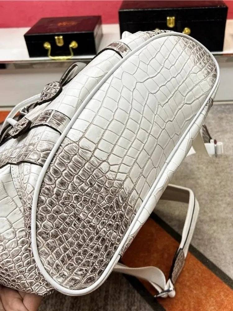 Genuine Crocodile Skin Backpack – Premium Designer Vintage Edition

Crafted from rare, authentic crocodile skin, this backpack is more than a bag — it’s a collector’s masterpiece. With its natural, one-of-a-kind scale