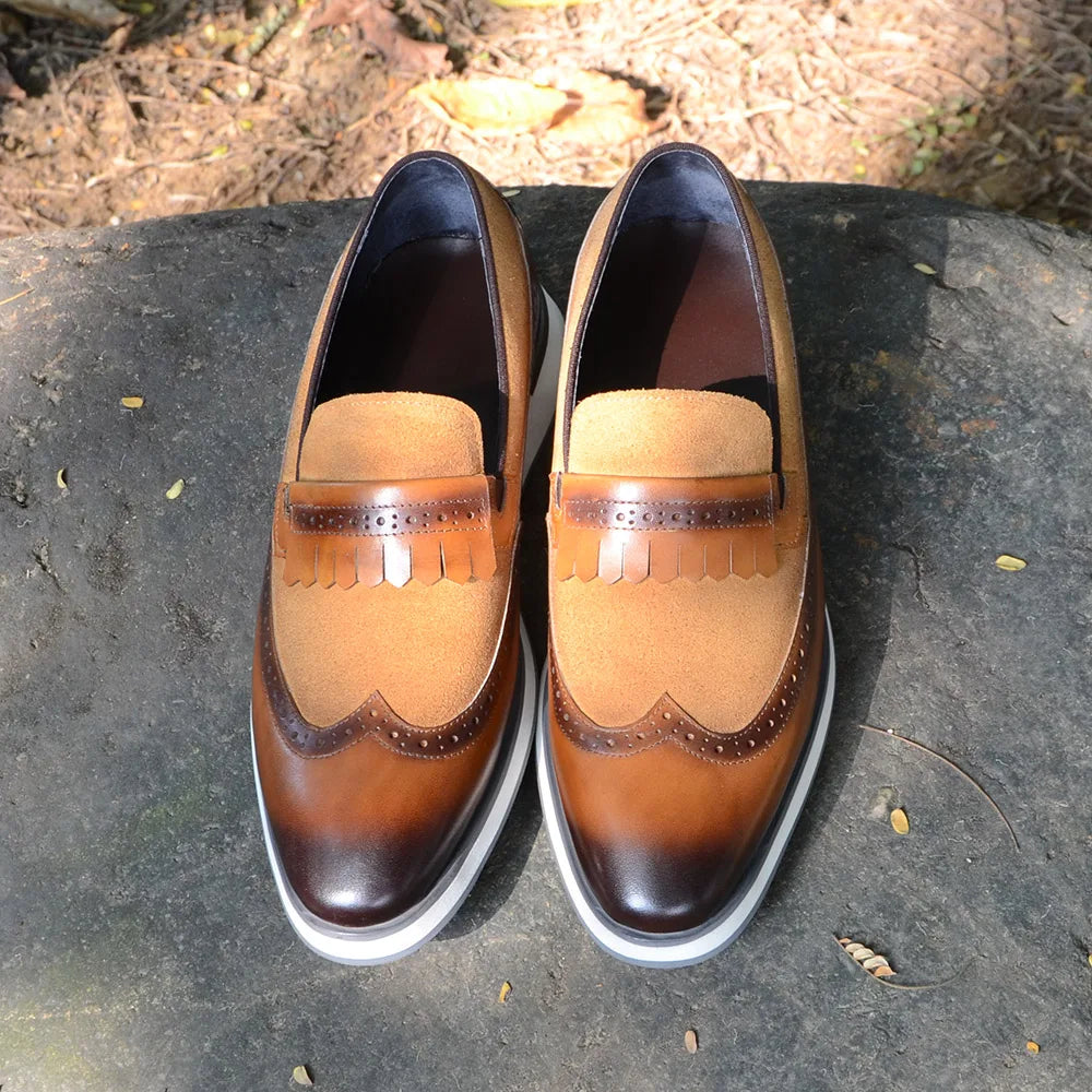 1.	HollandLuxe Exclusive – European Cow Suede Leather Wingtip Loafers
	2.	Luxury Men’s Sneakers-Loafers – Genuine Leather with Tassel Detail
	3.	Collector’s Edition Suede Wingtip Slip-On – Business & Casual Elegance