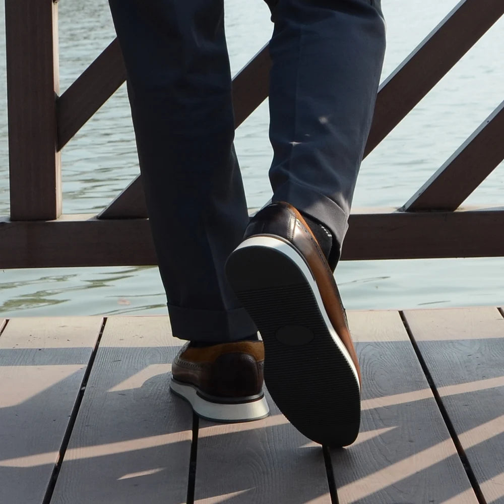 1.	HollandLuxe Exclusive – European Cow Suede Leather Wingtip Loafers
	2.	Luxury Men’s Sneakers-Loafers – Genuine Leather with Tassel Detail
	3.	Collector’s Edition Suede Wingtip Slip-On – Business & Casual Elegance