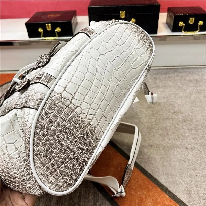 Genuine Crocodile Skin Backpack – Premium Designer Vintage Edition

Crafted from rare, authentic crocodile skin, this backpack is more than a bag — it’s a collector’s masterpiece. With its natural, one-of-a-kind scale