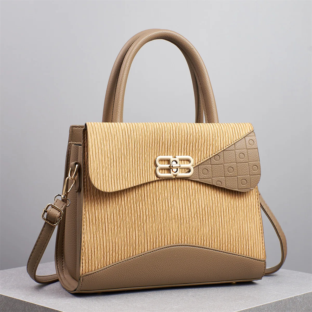 Step into elegance with the Étoile Embossed Tote, a distinguished piece from the Holland Luxe Global Collectors’ Series. Designed with a spacious interior and refined embossed texture, this versatile handbag blends sophist