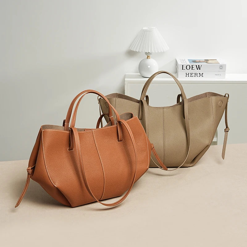 Indulge in timeless elegance with this Luxury Cow Leather Tote Bag, a spacious designer handbag crafted for the modern woman. Stylish and versatile — perfect as a shoulder, hobo, or shopper bag for everyday sophistication.