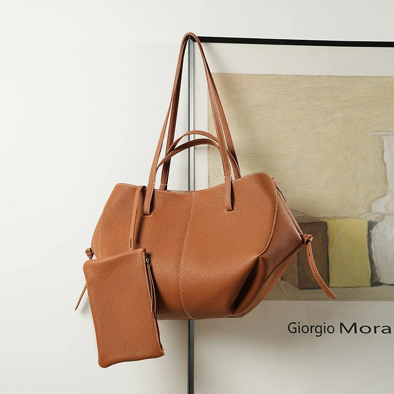 Indulge in timeless elegance with this Luxury Cow Leather Tote Bag, a spacious designer handbag crafted for the modern woman. Stylish and versatile — perfect as a shoulder, hobo, or shopper bag for everyday sophistication.