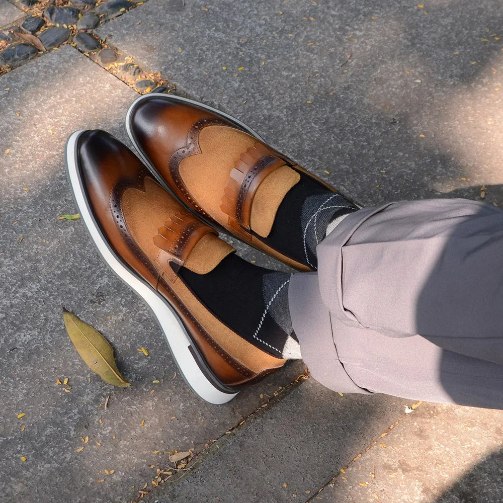1.	HollandLuxe Exclusive – European Cow Suede Leather Wingtip Loafers
	2.	Luxury Men’s Sneakers-Loafers – Genuine Leather with Tassel Detail
	3.	Collector’s Edition Suede Wingtip Slip-On – Business & Casual Elegance