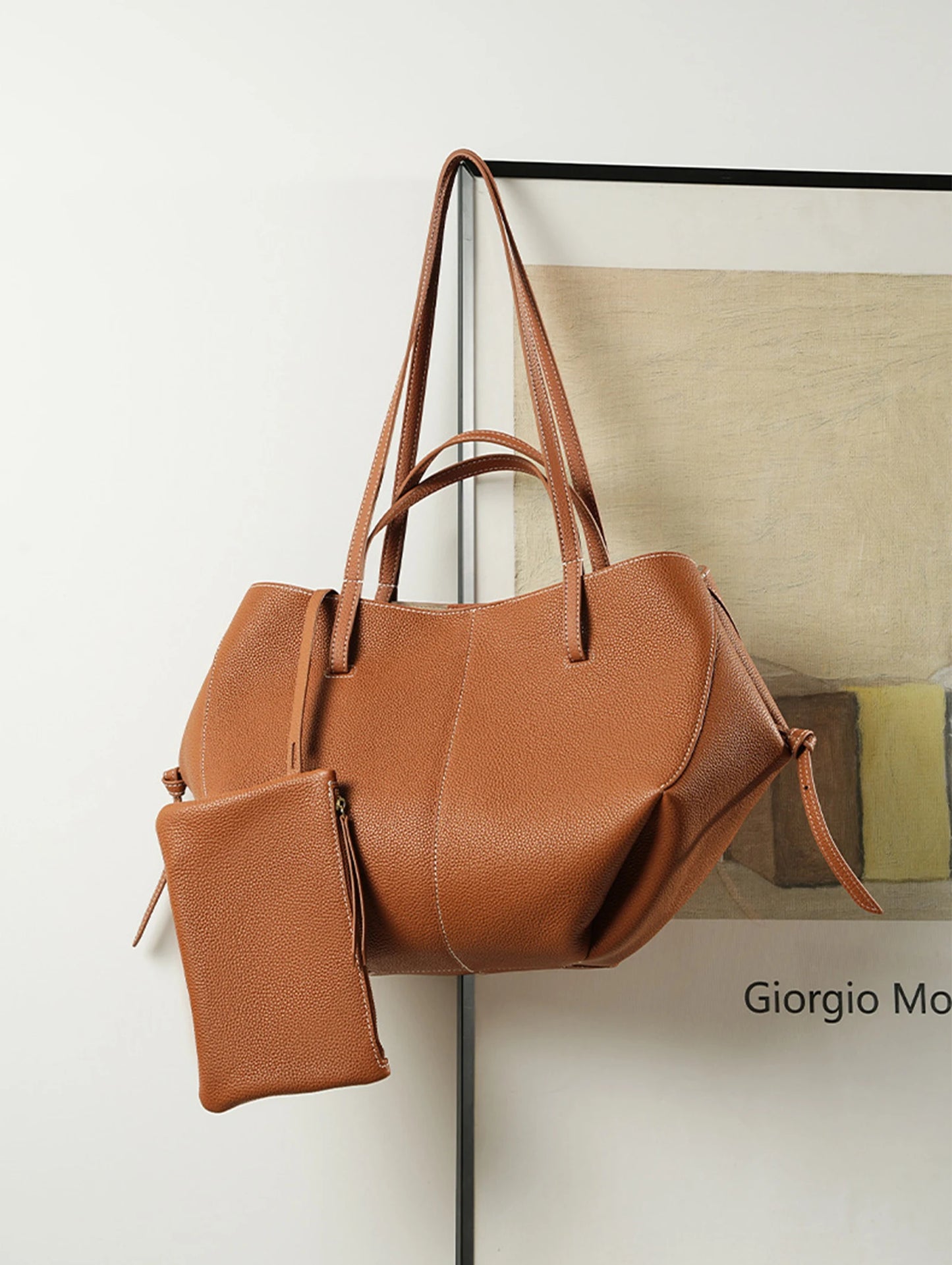 Indulge in timeless elegance with this Luxury Cow Leather Tote Bag, a spacious designer handbag crafted for the modern woman. Stylish and versatile — perfect as a shoulder, hobo, or shopper bag for everyday sophistication.