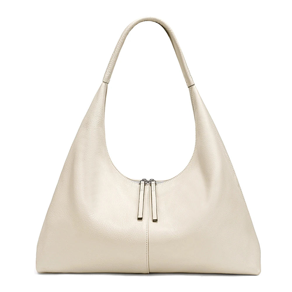 Stay stylish and organized with the Zency Large-Capacity Tote Bag, crafted from 100% genuine leather. A soft and elegant hobo-style handbag perfect for work, shopping, or winter outings — ideal for modern women