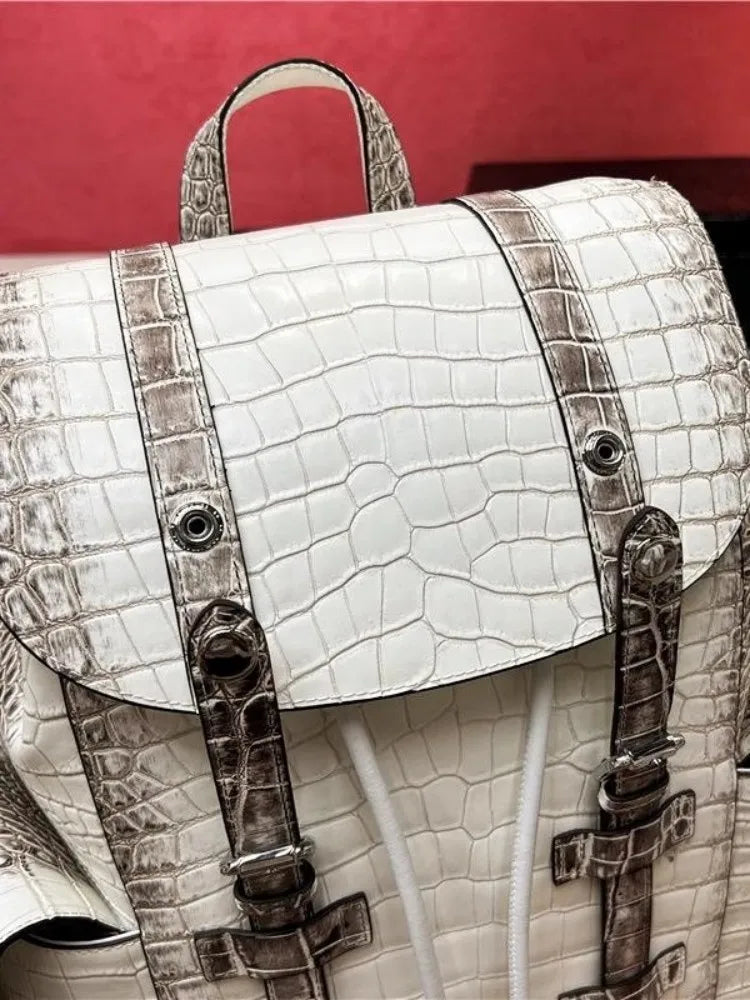Genuine Crocodile Skin Backpack – Premium Designer Vintage Edition

Crafted from rare, authentic crocodile skin, this backpack is more than a bag — it’s a collector’s masterpiece. With its natural, one-of-a-kind scale