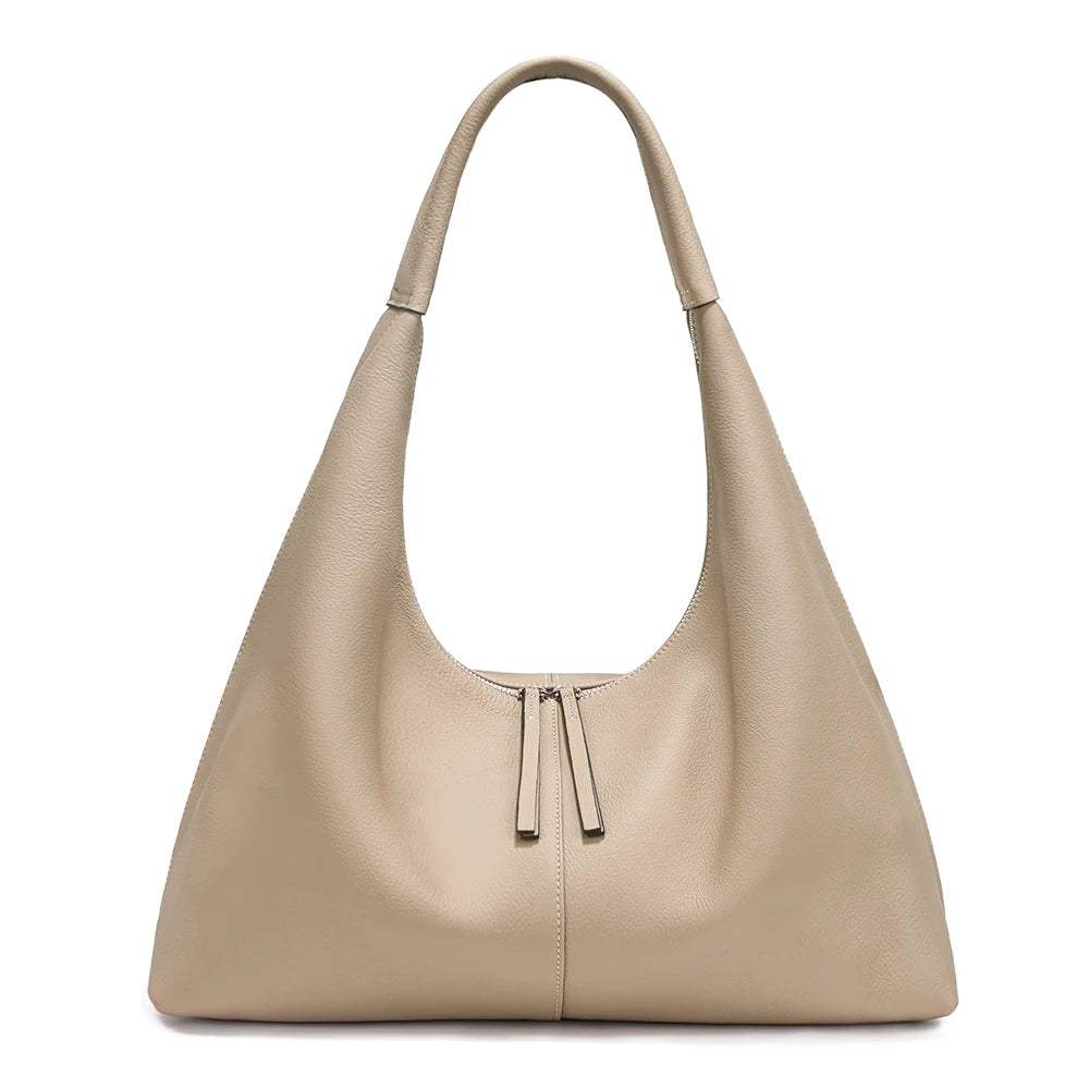 Stay stylish and organized with the Zency Large-Capacity Tote Bag, crafted from 100% genuine leather. A soft and elegant hobo-style handbag perfect for work, shopping, or winter outings — ideal for modern women