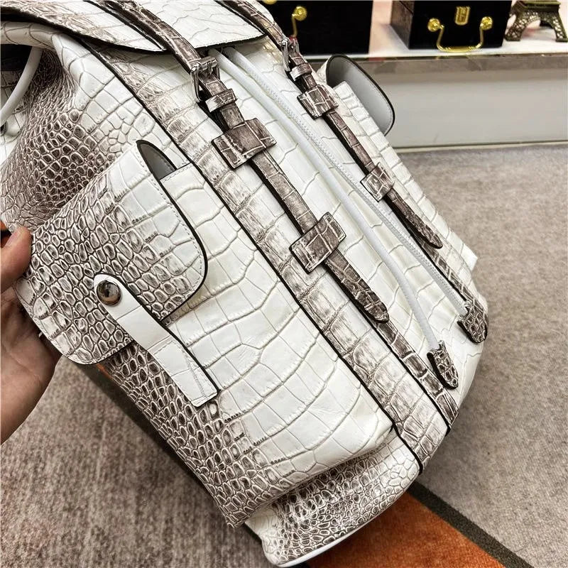 Genuine Crocodile Skin Backpack – Premium Designer Vintage Edition

Crafted from rare, authentic crocodile skin, this backpack is more than a bag — it’s a collector’s masterpiece. With its natural, one-of-a-kind scale