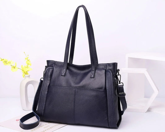 Experience effortless sophistication with this Genuine Leather Cowhide Women’s Tote, a large-capacity luxury designer bag crafted for modern women and mothers. Perfect as a handheld, shoulder, or crossbody bag