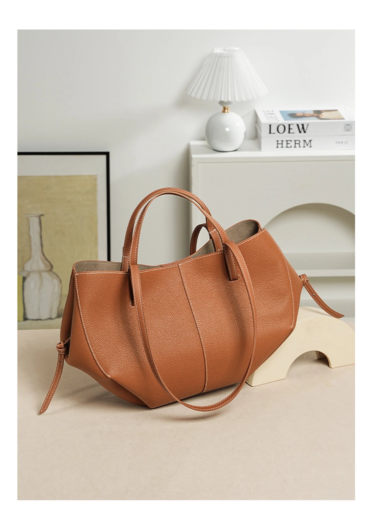Indulge in timeless elegance with this Luxury Cow Leather Tote Bag, a spacious designer handbag crafted for the modern woman. Stylish and versatile — perfect as a shoulder, hobo, or shopper bag for everyday sophistication.