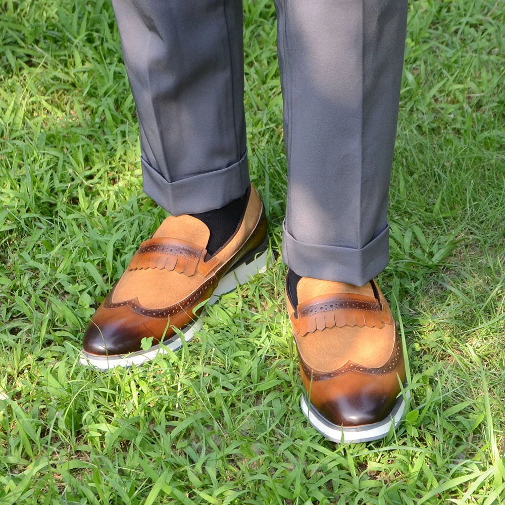 1.	HollandLuxe Exclusive – European Cow Suede Leather Wingtip Loafers
	2.	Luxury Men’s Sneakers-Loafers – Genuine Leather with Tassel Detail
	3.	Collector’s Edition Suede Wingtip Slip-On – Business & Casual Elegance